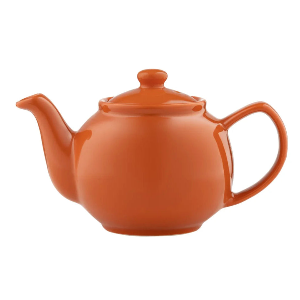 Lite större tekanna i färgen burnt orange. Tillverkad av stengogd , rymmer 1.1 liter