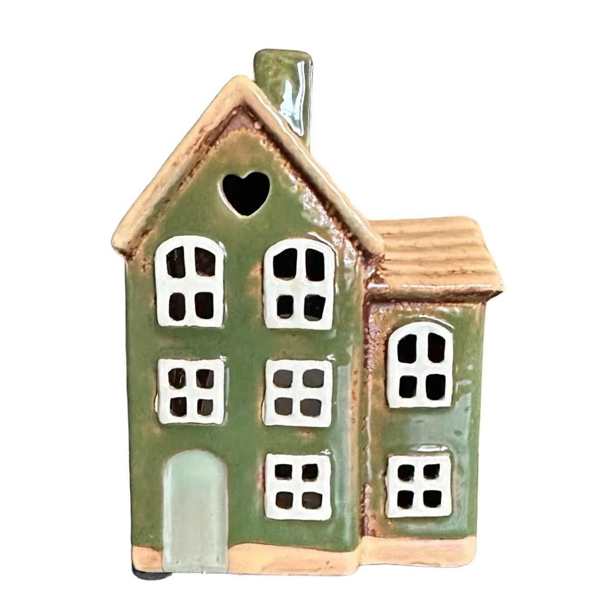 Grönt keramikhus med vita fönster