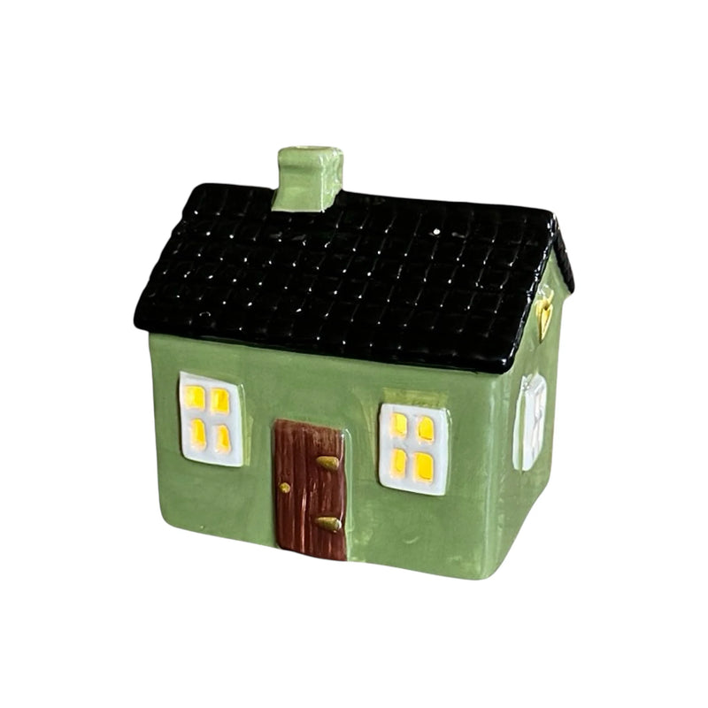 Grönt keramikhus med hjärta