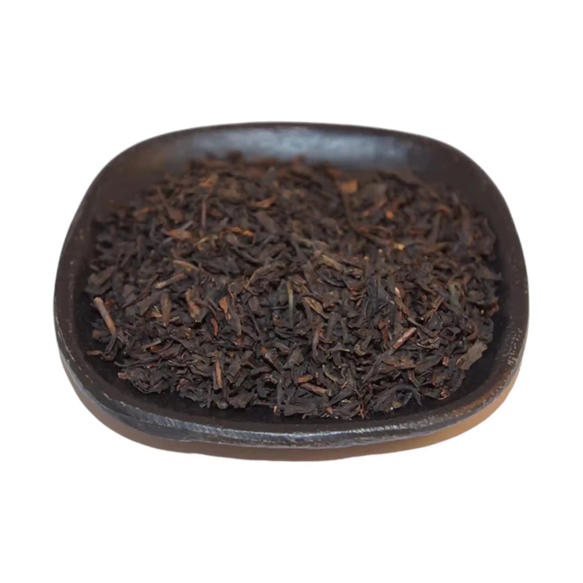 KOLA/KARAMELL är ett svart te med smak av kola, karamell, grädde och mandel.