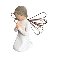 En ängel som knäböjer och ber